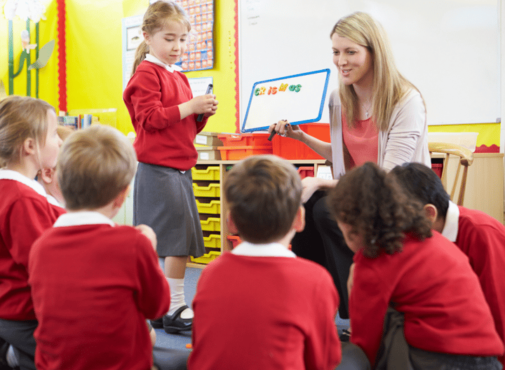 Image of children learning spelling in class